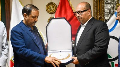 fih-president-tayyab-ikram-decorated-with-the-collar-of-honor-by-the-egyptian-olympic-committee.Click to read full article.